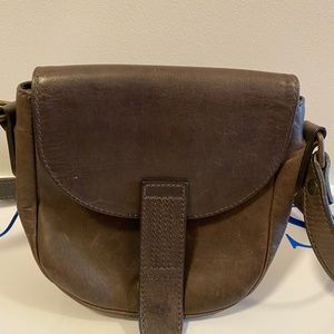 Small cross body handbag, brown-grey color, in leather.